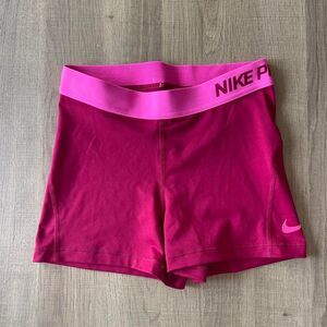 Nike Pro Women's 3" compression shorts in a pink color variant Medium